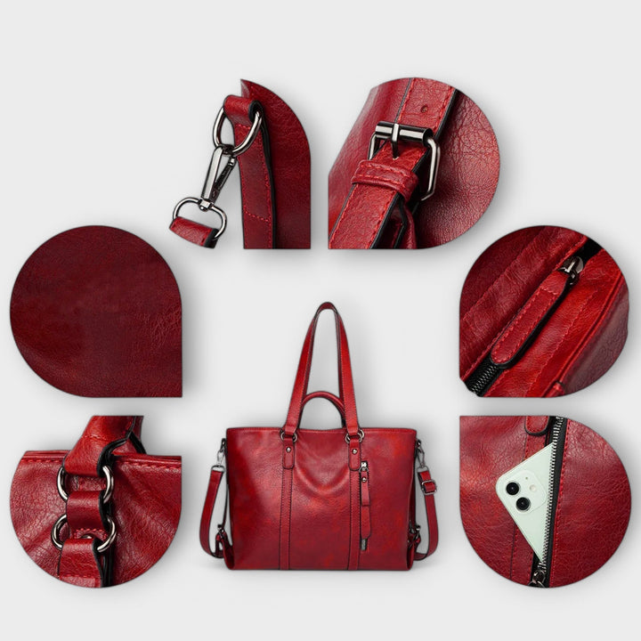 Stylish navy blue leather shoulder bag for women, a large tote perfect for a professional look.