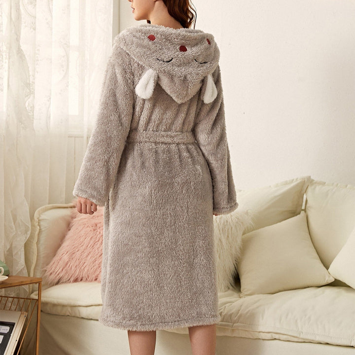 Relax in this ultra-soft women's plush animal print robe, a cozy fleece bathrobe for home comfort.