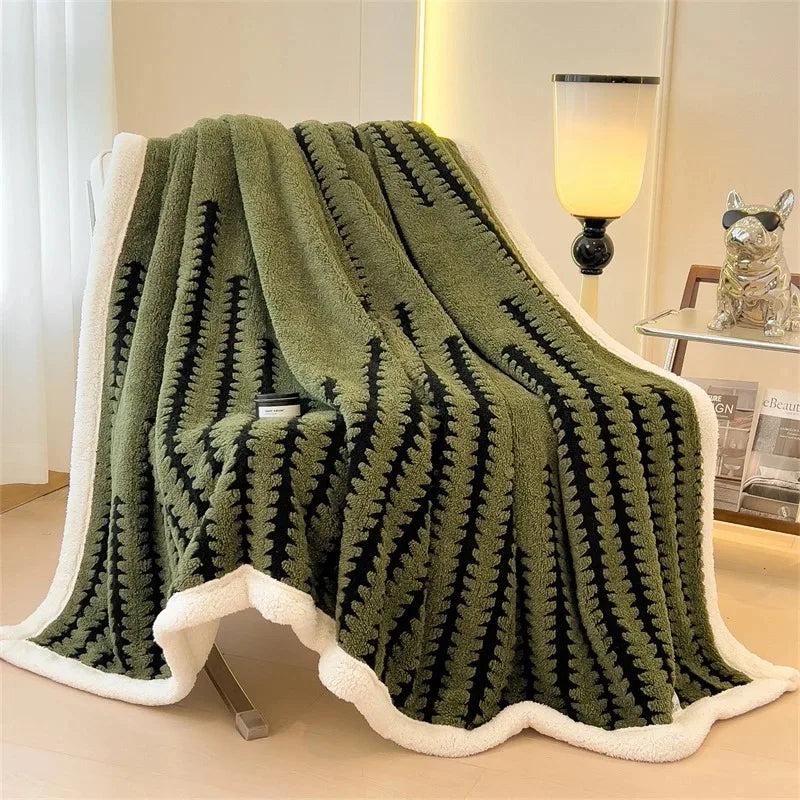 Elegant geometric throw, reversible design with soft sherpa fleece. Perfect for any room.