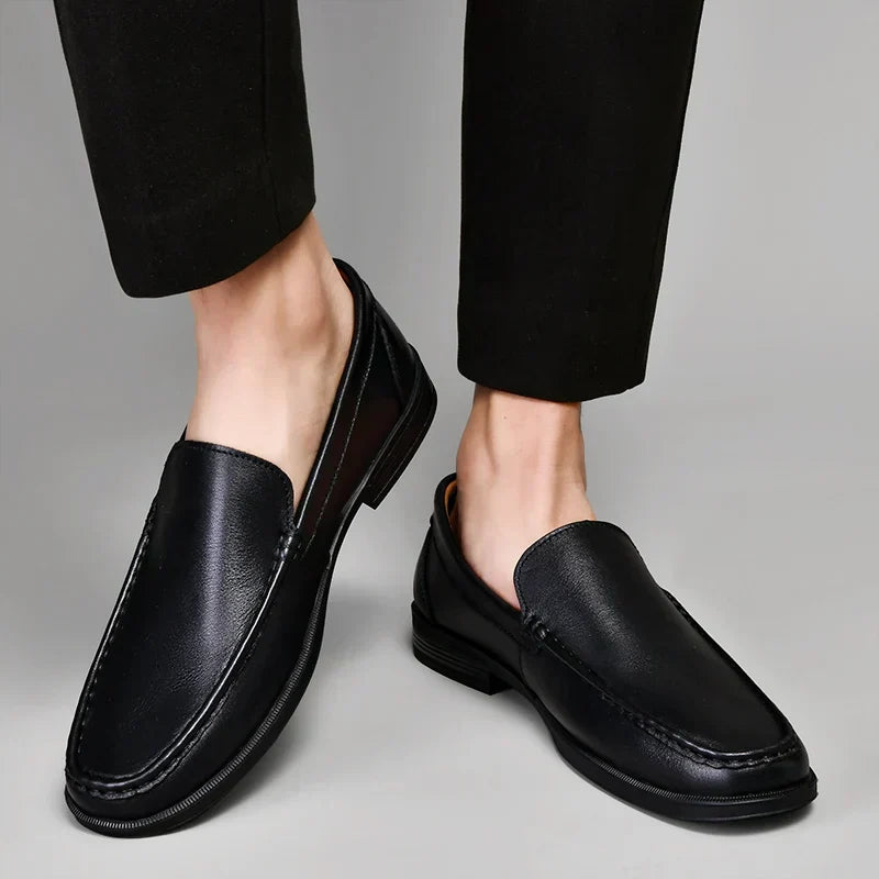 Stylish men's brown loafers, easy slip-on for formal events or casual outings.
