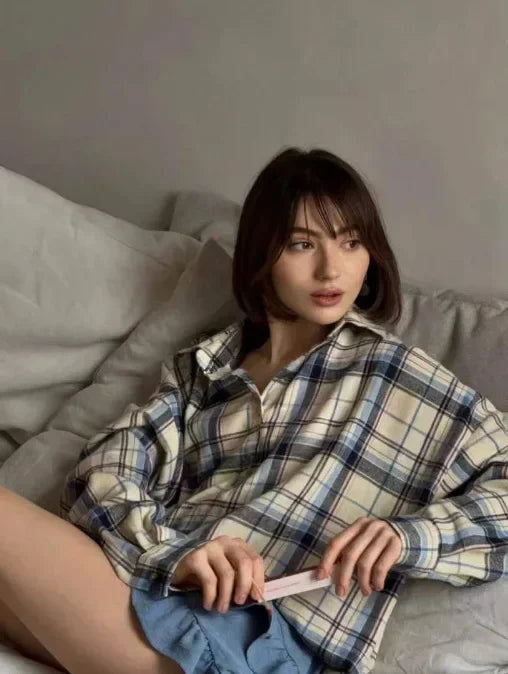 Chic & trendy women's checkered long sleeve shirt. Casual button-down top for versatile everyday fashion.