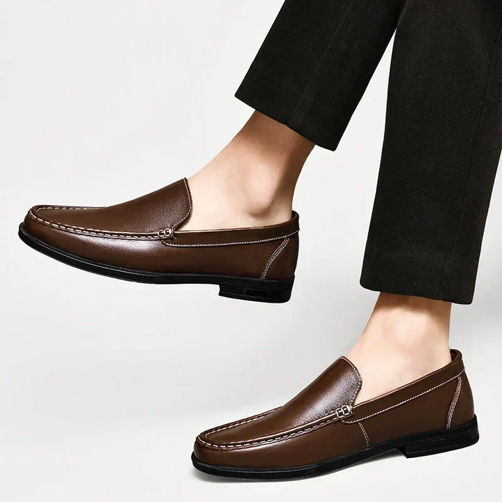 Men's comfortable brown loafers, easy slip-on style for modern versatile fashion.