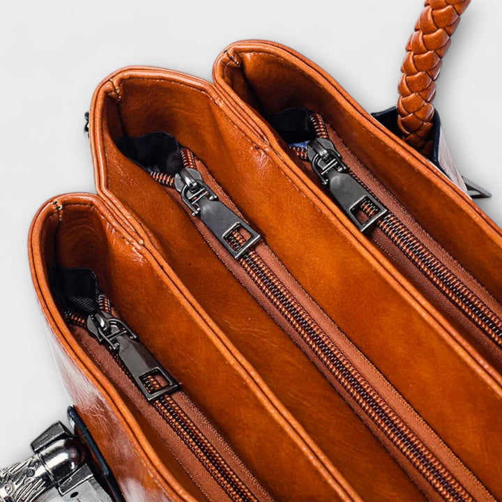 Luxurious leather duffle bag. Classic elegant design, perfect for travel, work, and everyday use. Unisex.