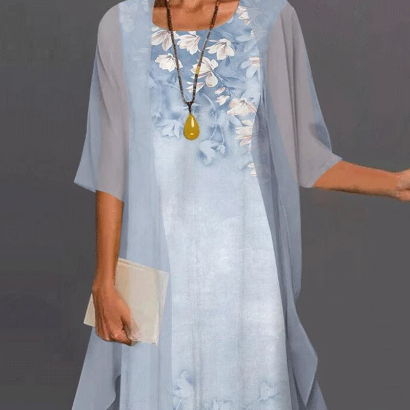 Elegant floral midi dress for women, chic and casual. Ideal day or evening dress for versatile fashion.