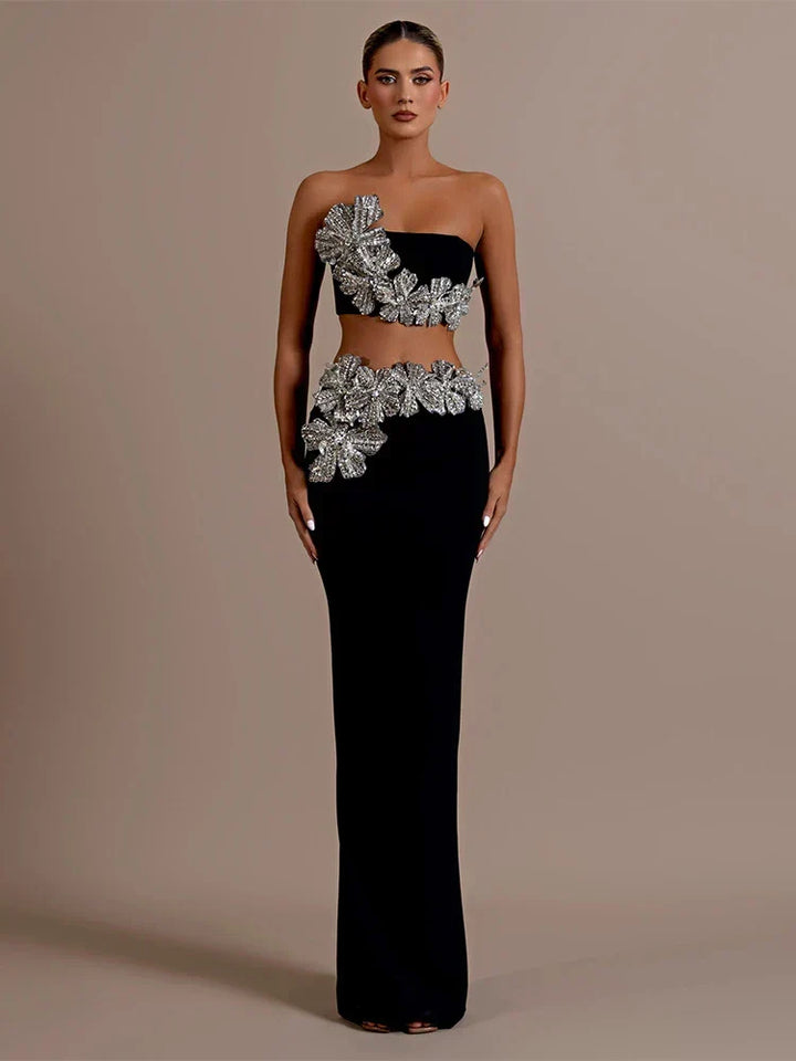 Sparkling women's embellished two-piece set for a girls' night out, featuring an elegant top and mini skirt.