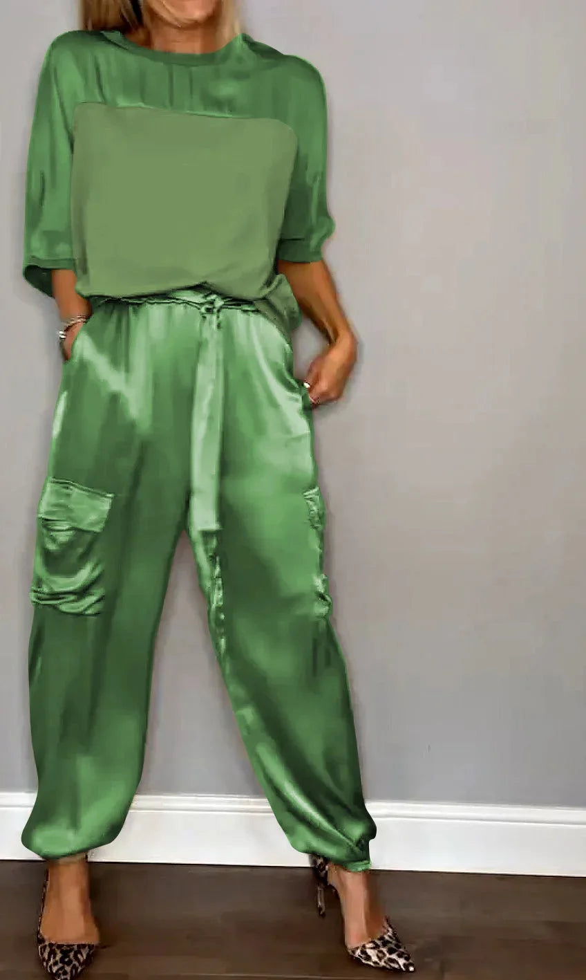 Plus-size women's comfortable flowing two-piece set, stylish & versatile for any occasion, from casual to elegant.