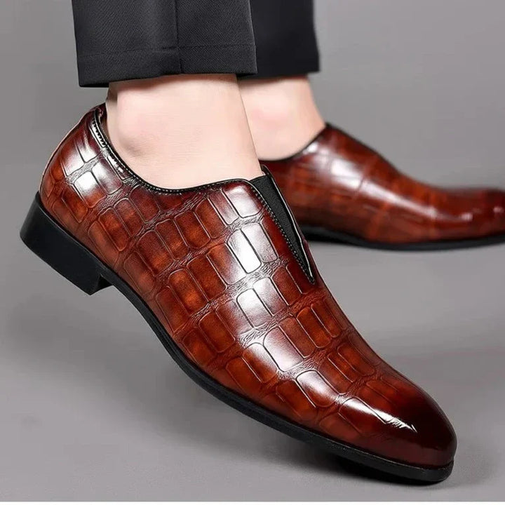 Formal men's glossy crocodile pattern dress shoes, easy slip-on design for ultimate comfort and sophistication.