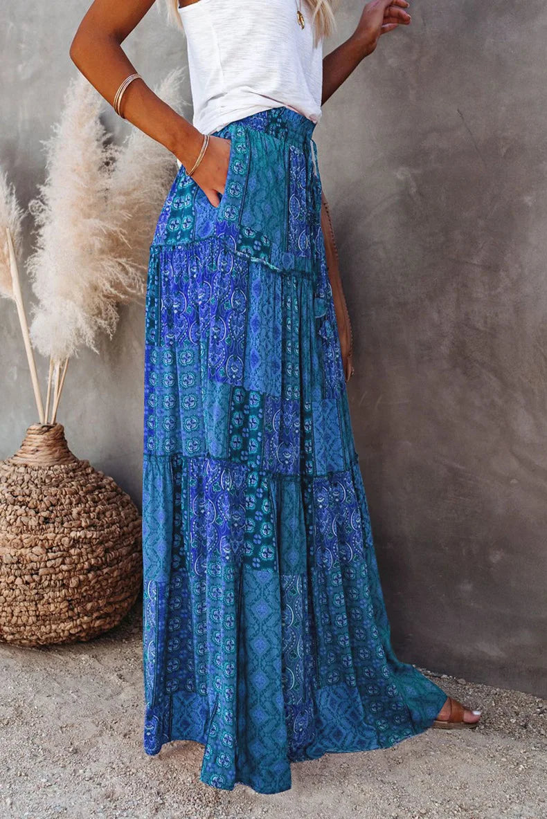 Elegant women's A-line maxi skirt, high-waisted with a stunning floral pattern.