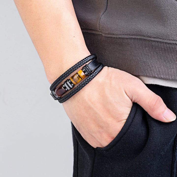 Boost your everyday style with this confident men's braided tiger eye stone wrist bracelet.
