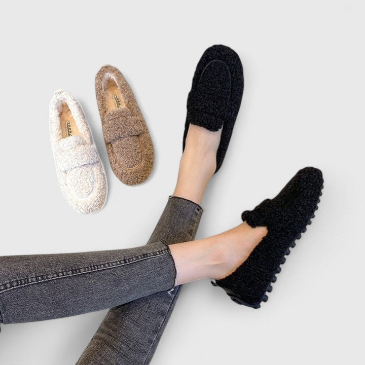 Elegant women's warm slippers, cozy loafer style for indoor comfort. Non-slip winter footwear.