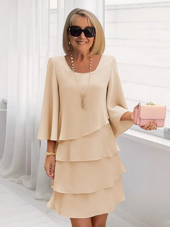 Khaki elegant ruffle A-line comfort dress for women. Versatile midi length, flattering fit for any occasion.