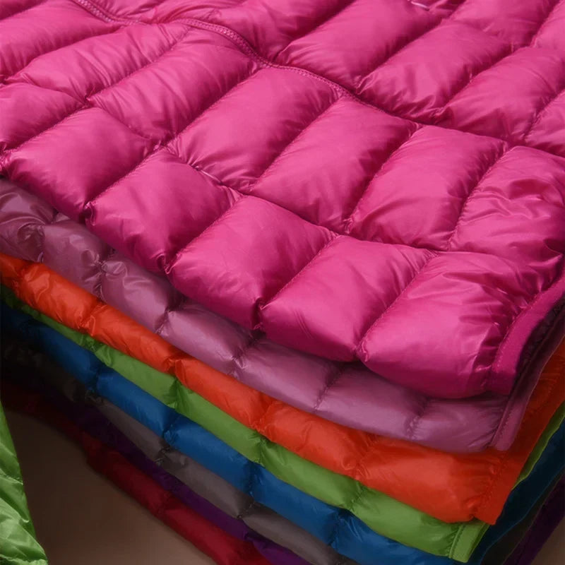 Women's hooded insulated jacket, ultra-light. Essential for winter, everyday comfort & warmth.