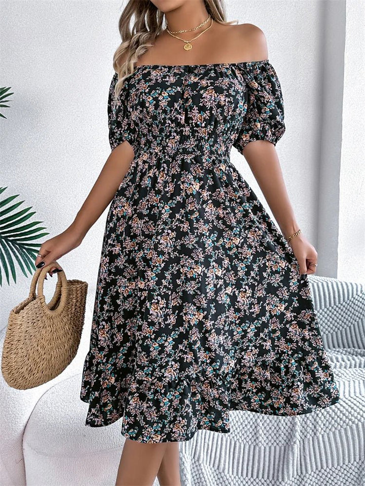 Women's floral smocked midi dress with elegant puff sleeves. Comfortable and stylish for autumn.