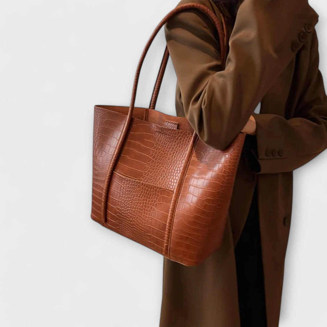 Sophisticated vintage style women's shoulder bag, a durable faux leather handbag for fashion-forward days.