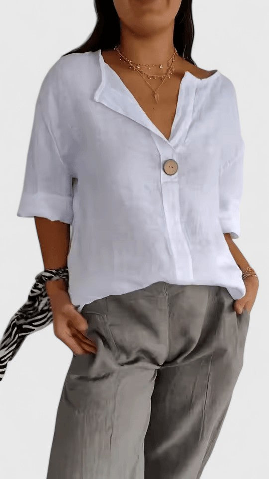 Feminine chic V-neck top for women with a unique knot design, offering an elegant and relaxed fit.