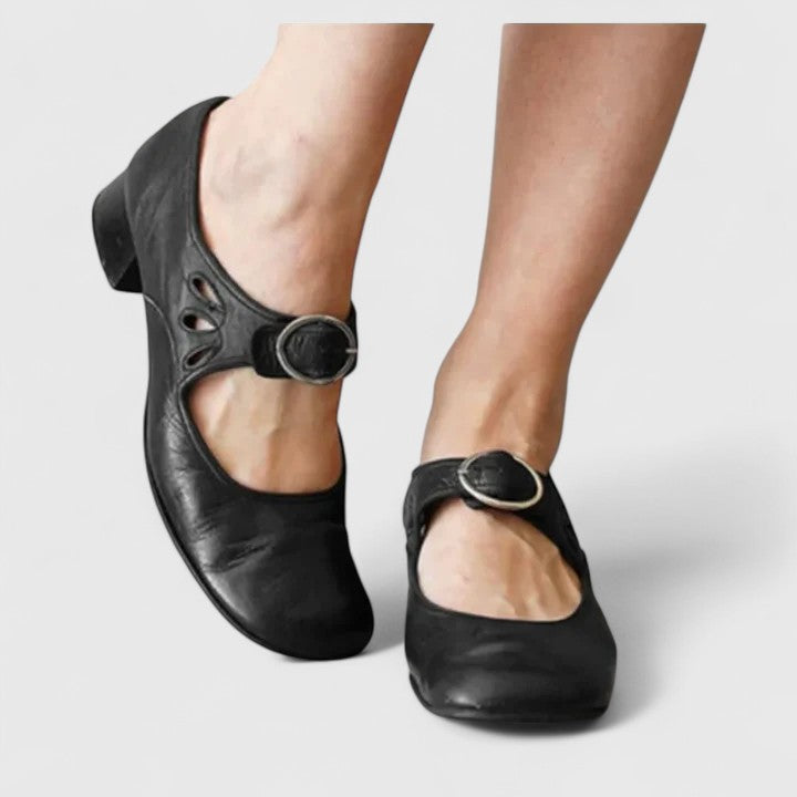 Comfortable women's classic round toe high heels with secure ankle strap, ideal for all-day wear.