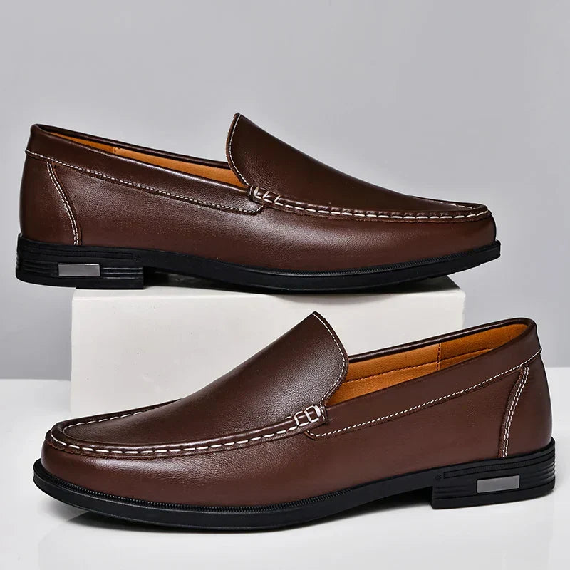 Men's formal black loafers, comfortable slip-on design for sophisticated events.