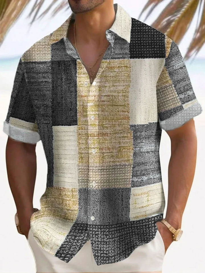 Men's vintage patchwork button-up shirt, short sleeve, relaxed fit. Colorful summer casual style.