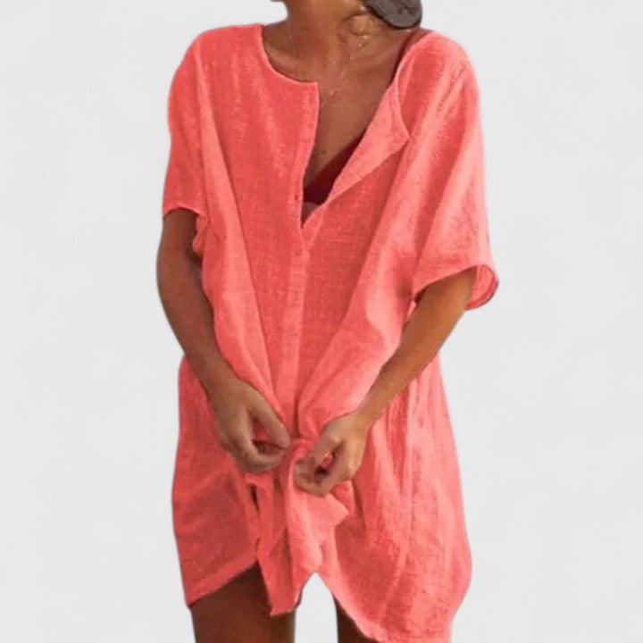 Graceful women's elegant tunic dress, ideal for sophisticated summer events or relaxed chic outings. Versatile.