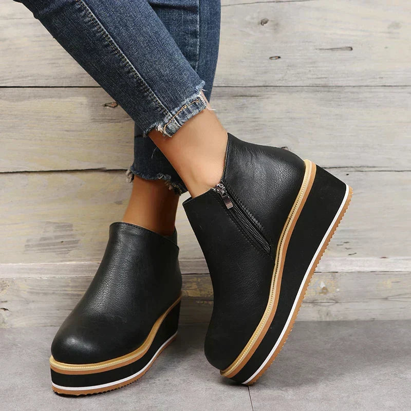 Fashionable women's orthopedic boots, featuring side zipper for easy wear & comfort.