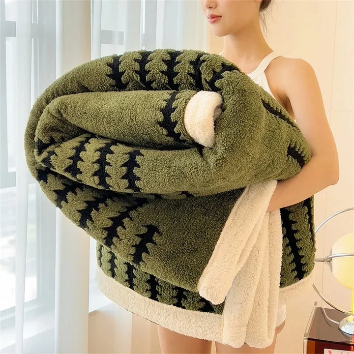 Luxurious reversible geometric throw blanket for cozy comfort & stylish bedroom accent.