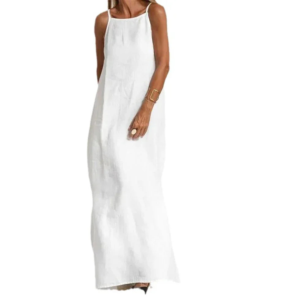 Sleeveless maxi slip dress with stylish side slits for women. Elegant vacation wear & comfortable summer fashion.
