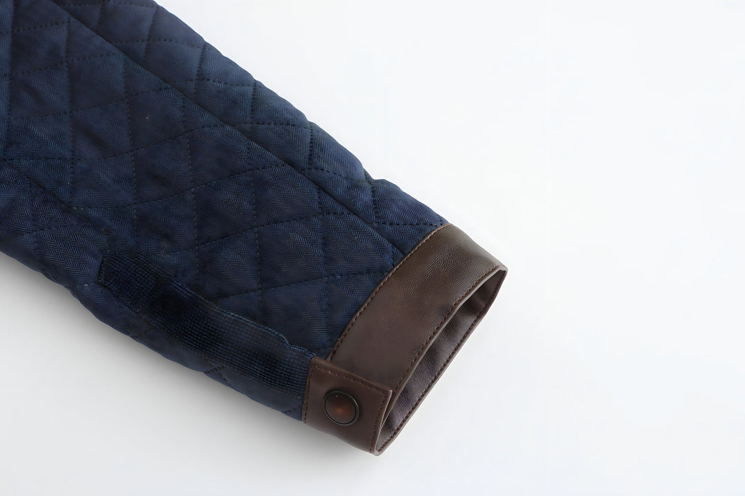 Versatile men's navy quilted jacket, button-down design, perfect for layering & fall comfort.