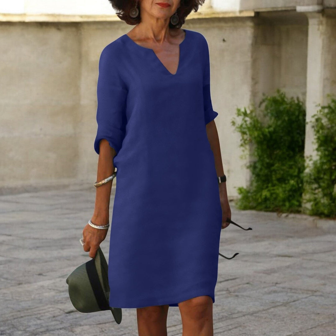 Chic women's midi dress. Flattering and comfortable for everyday or casual summer fashion.