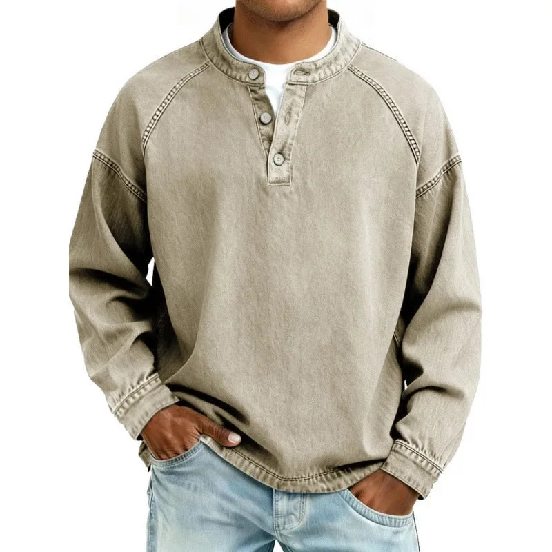 Man wearing a sophisticated vintage long sleeve button shirt, showcasing classic casual men's fashion style.