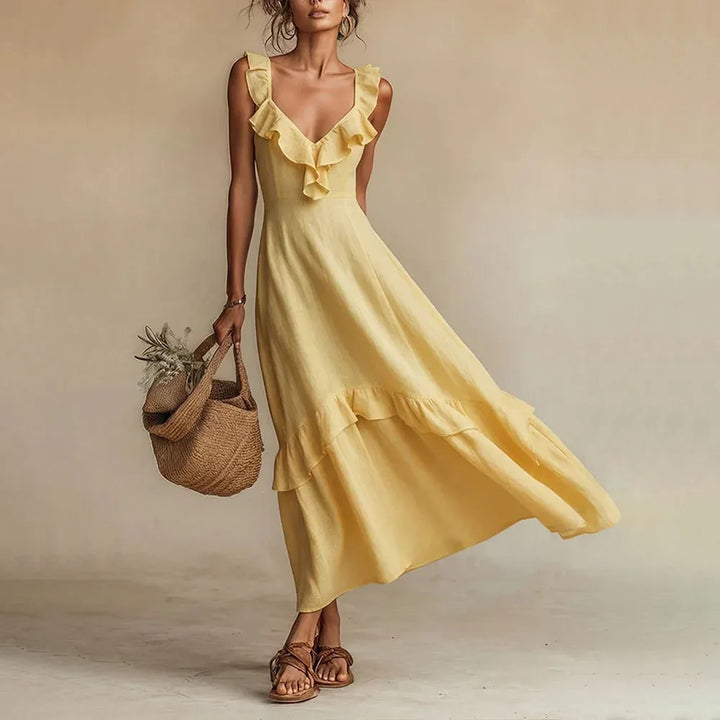 Close-up of a women's ruffle trim A-line maxi dress, highlighting the delicate ruffles and sleeveless design.
