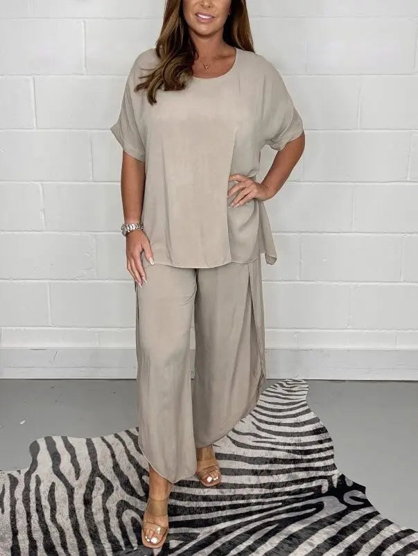 Comfortable women's lightweight sleeveless two-piece pants outfit for summer fashion.