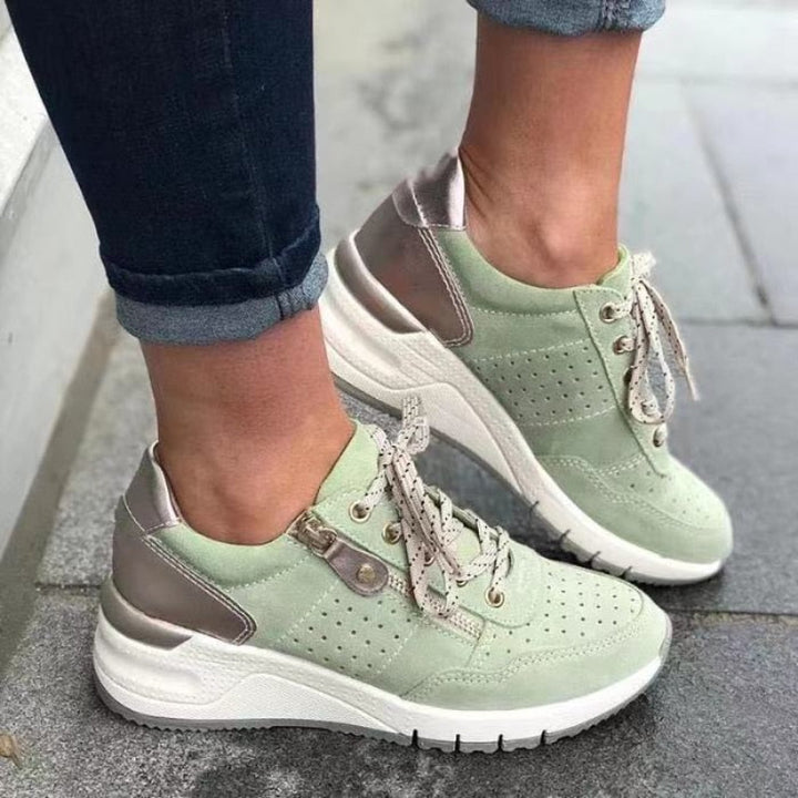 Women's lace-up zip wedge platform walking sneakers for casual comfort.