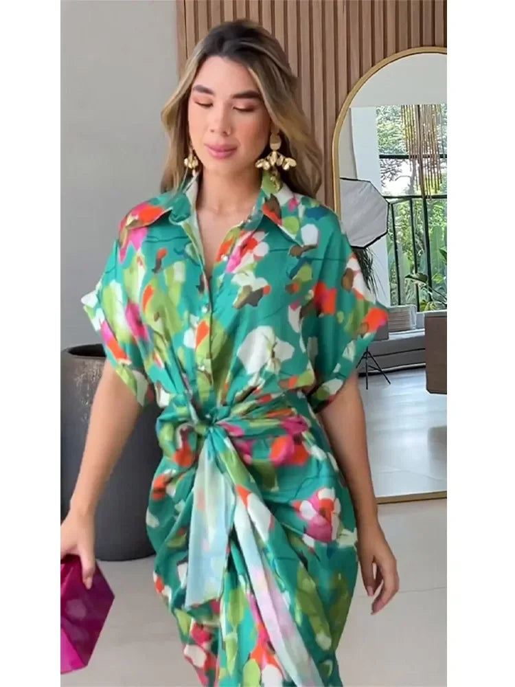 Long green floral maxi dress for women, featuring an elegant button-down design. A flowing and chic summer dress.