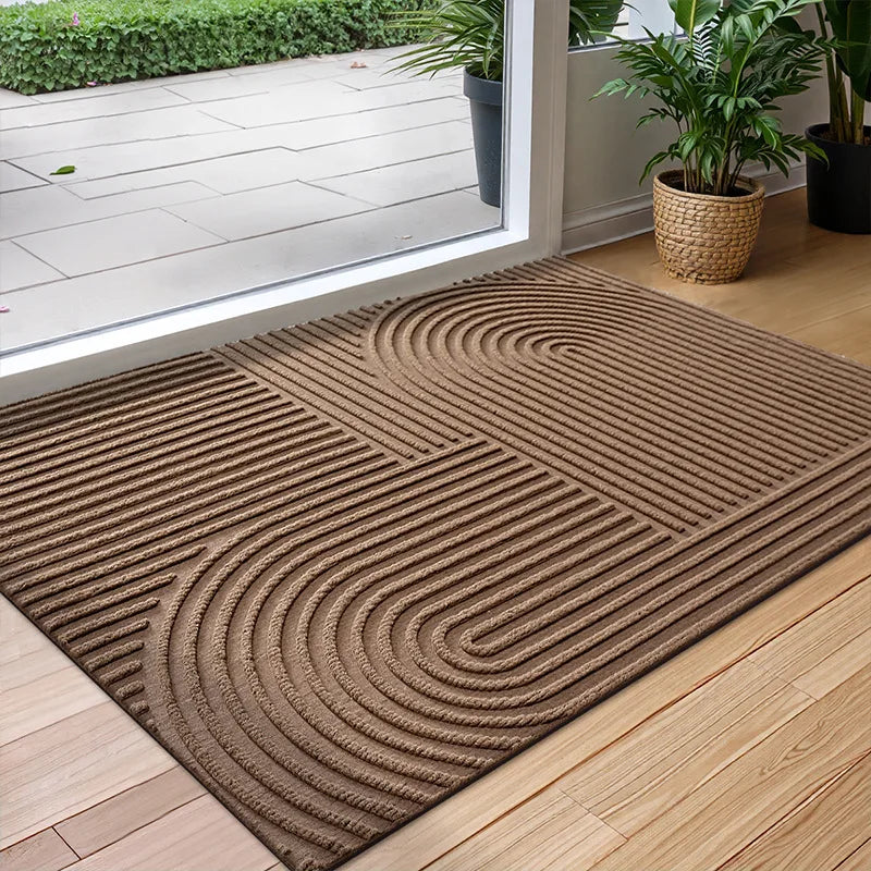 Grey polyester water-absorbing door mat, non-slip, quick-drying for indoor & outdoor use, durable entryway mat.
