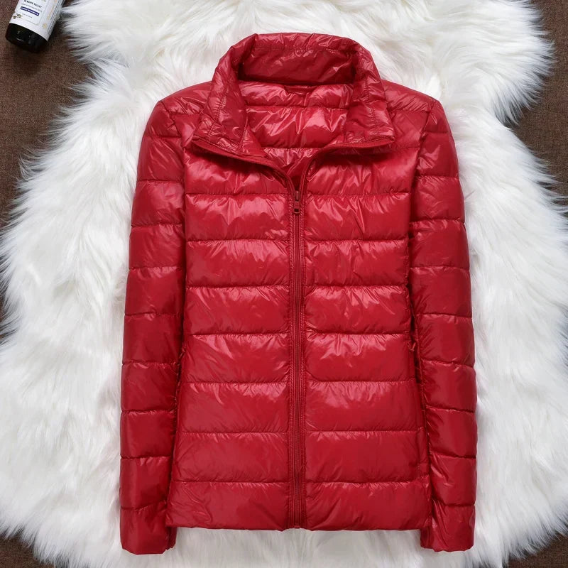 Everyday women's insulated jacket, hooded & lightweight. Warm, comfortable outerwear for winter.