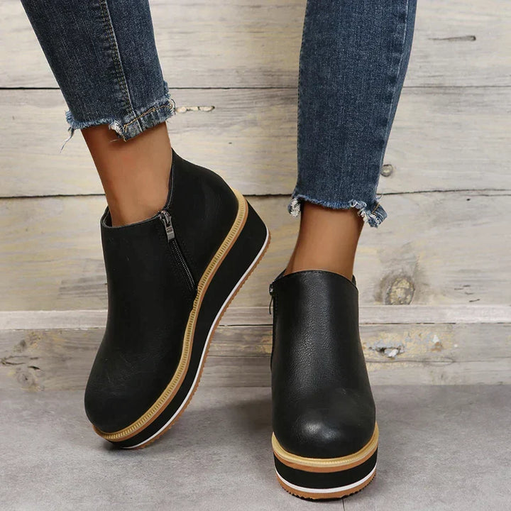 Comfort-focused orthopedic ankle boots for women, elegant and supportive footwear.