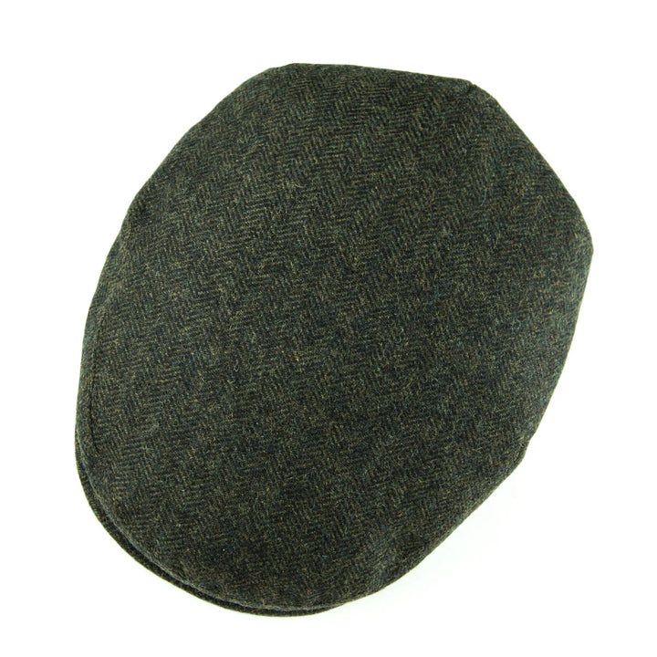 Studio shot: men's herringbone flat cap in a sophisticated, clean presentation.