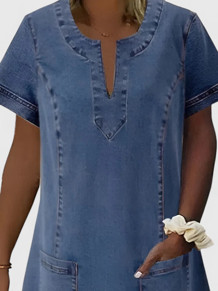 Versatile women's flowy blue dress with pockets, ideal for spring style, casual outings & comfortable everyday wear.