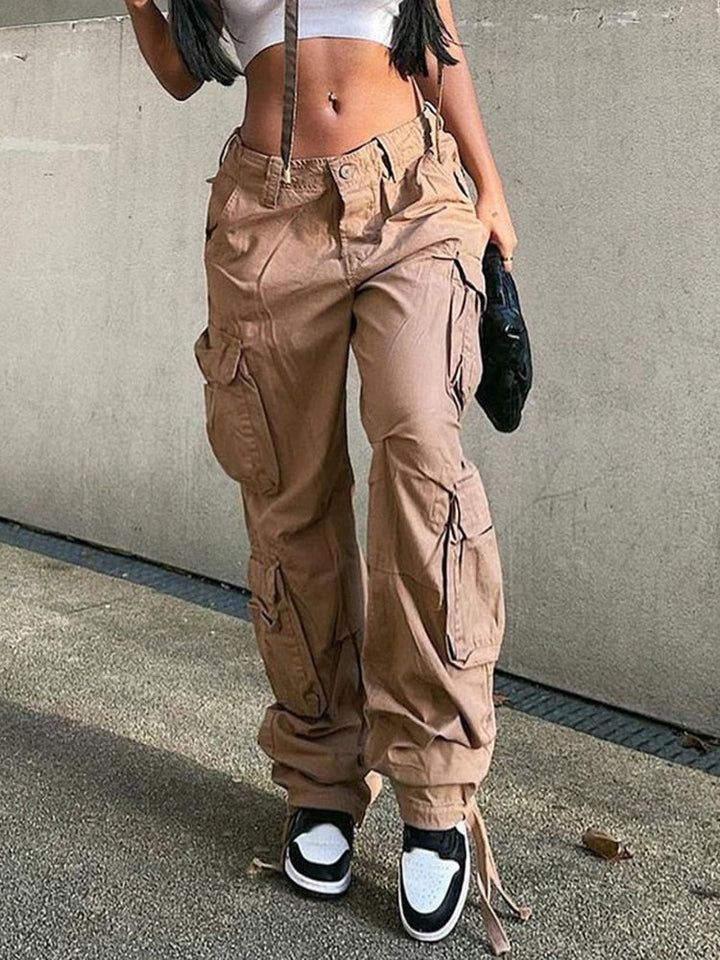 Fashionable women's wide leg cargo pants with multiple utility pockets, ideal for modern streetwear.