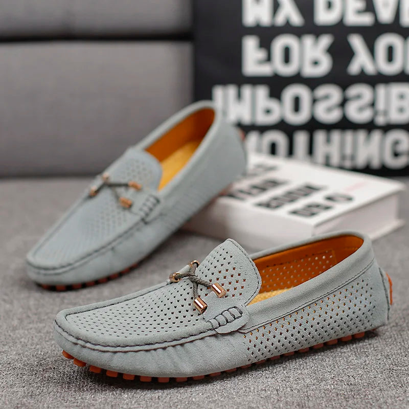 Side profile of men's comfortable classic loafers, highlighting breathable material and sleek design.