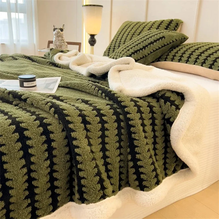 Warm, soft, reversible geometric pattern throw blanket. Ideal for stylish home living.