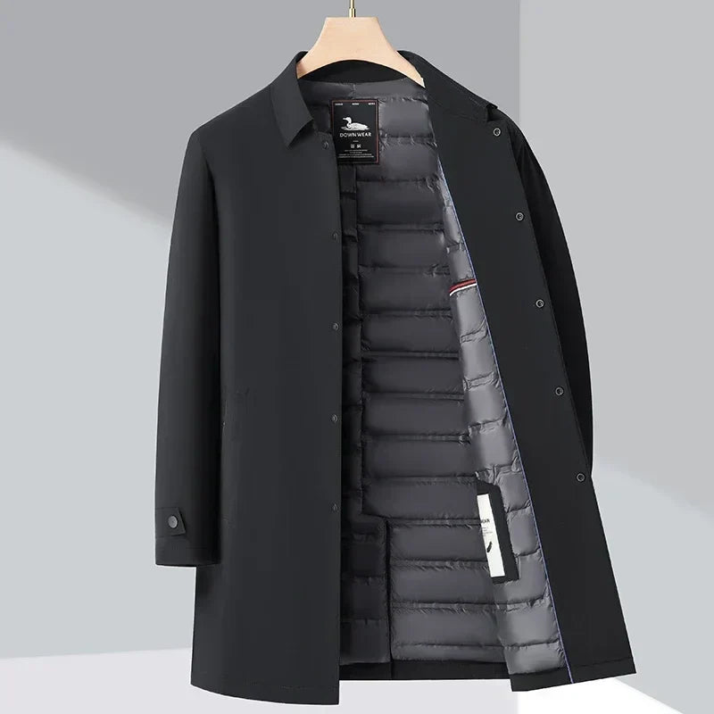 Stylish men's water-repellent trench coat, down-filled. Classic design, warm and perfect for autumn/winter outerwear.