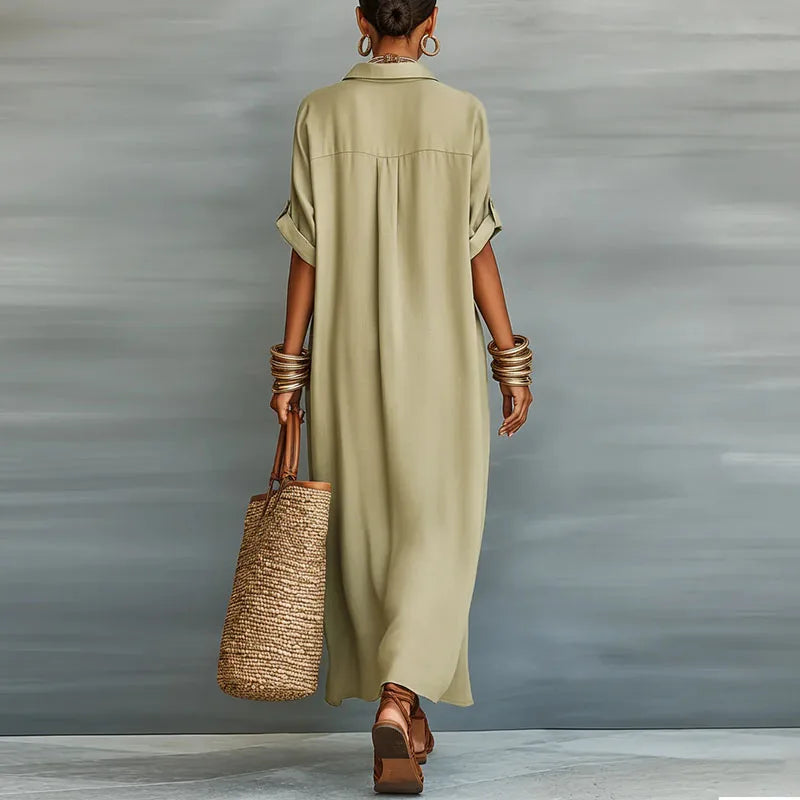 Relaxed fit women's maxi shirt dress with collar, short sleeves, and full button-down front.
