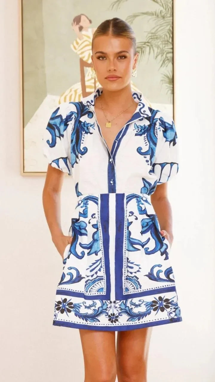 Fresh floral print mini dress for women, featuring elegant puff sleeves, casual style.