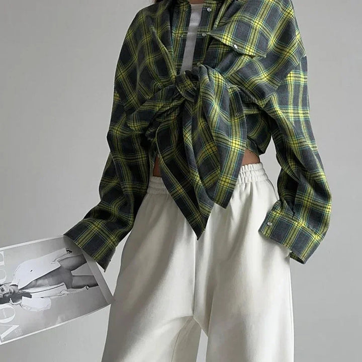 Trendy ladies long sleeve checkered shirt, ideal for casual everyday wear. Chic and versatile fall/spring top.