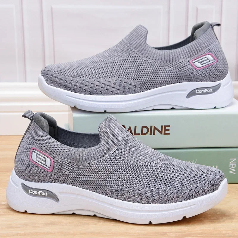 Easy slip-on women's orthopedic trainers, perfect for walking, featuring arch support & breathability.