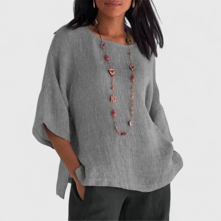 Women's comfortable blouse, relaxed fit, O-neck, three-quarter sleeve. Perfect for casual summer fashion.