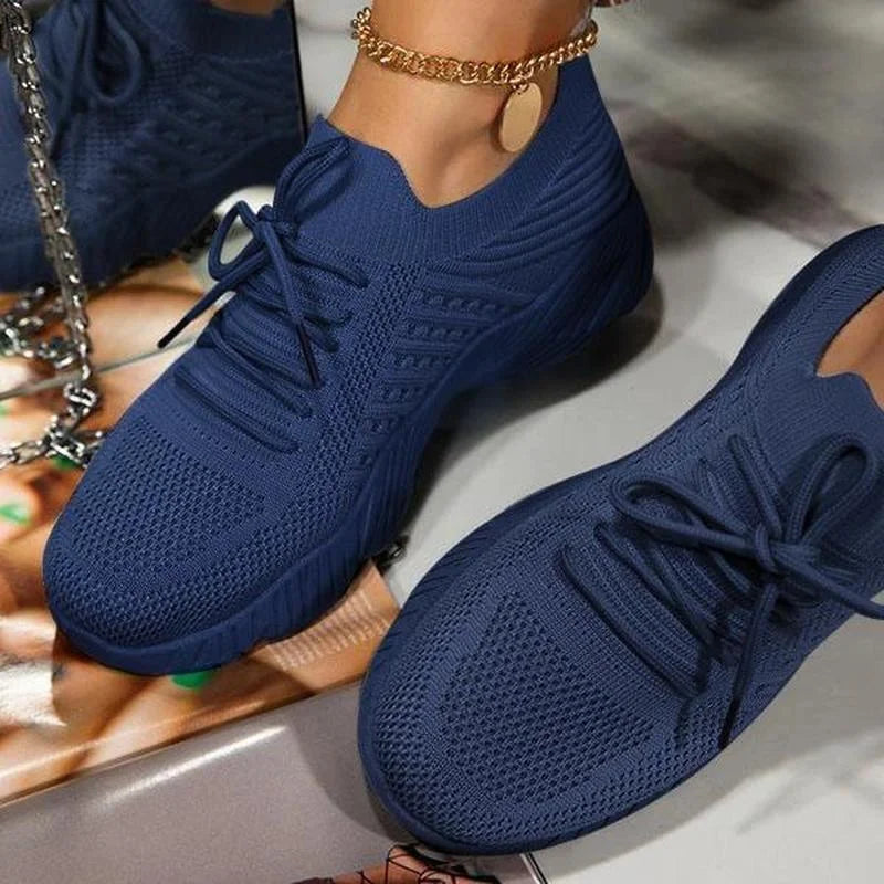 Posture-correcting women's walking sneakers, designed for ultimate comfort and foot support during daily activities.