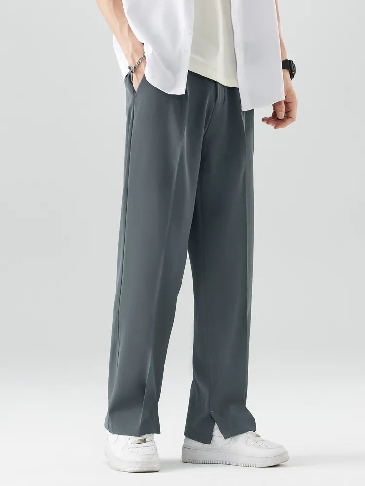 Dark grey men's straight leg chino trousers, relaxed fit, breathable fabric for all-day comfort.