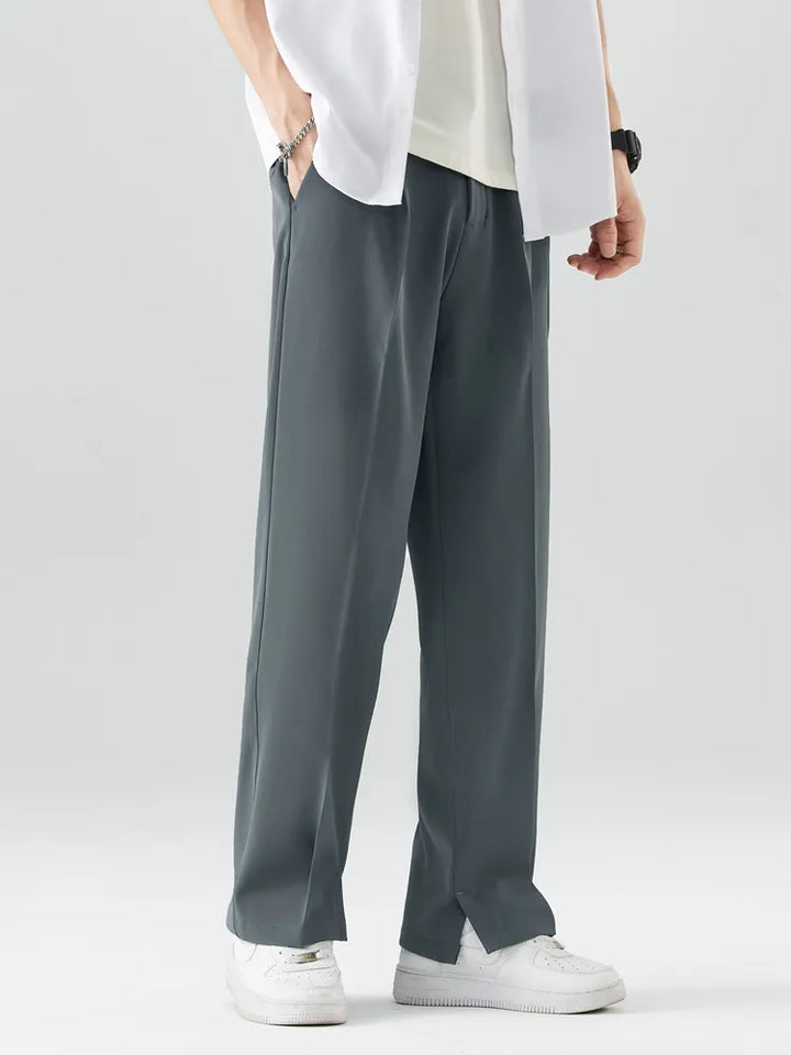 Dark grey men's straight leg chino trousers, relaxed fit, breathable fabric for all-day comfort.